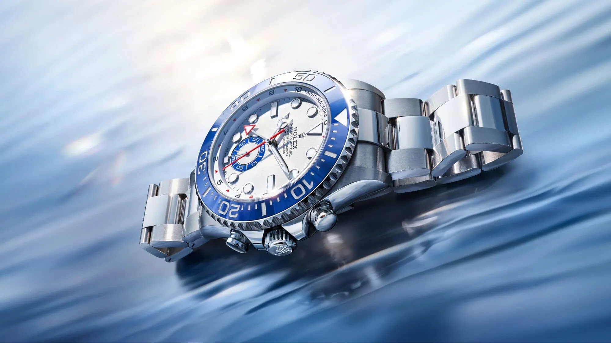 Rolex Yacht-Master II watch with blue bezel on water - Washington Watches